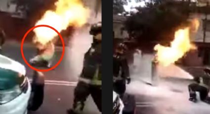 ¡Un héroe! Bombero carga tanque de gas en LLAMAS y evita explosión: VIDEO