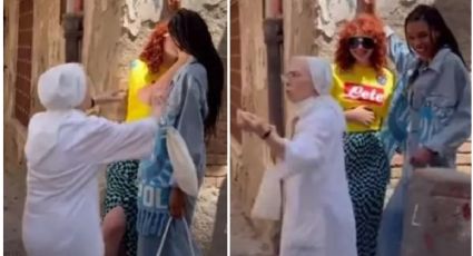 "¡El diablo!" Monja indignada interrumpe BESO entre dos mujeres y las redes no la perdonan: VIDEO