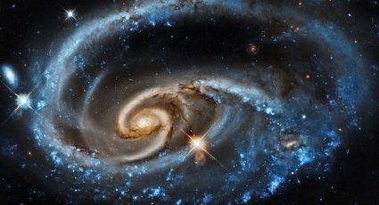 Foto: Captan el espectacular choque de dos galaxias fusionándose en una "mariposa cósmica"